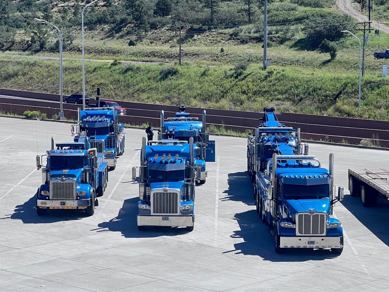 Five Western Towing rotators and heavy wreckers lined up